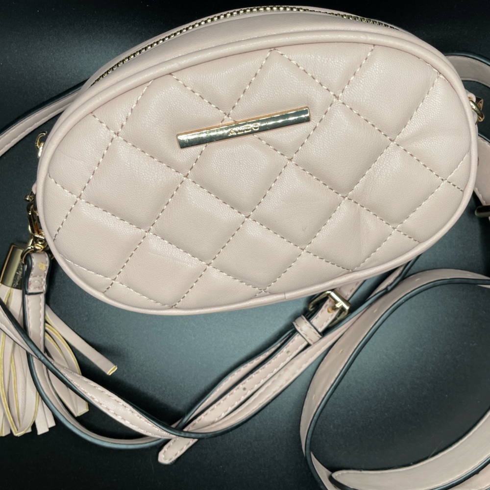 ALDO compact pouch. Over the shoulder, across the body or around the waist.